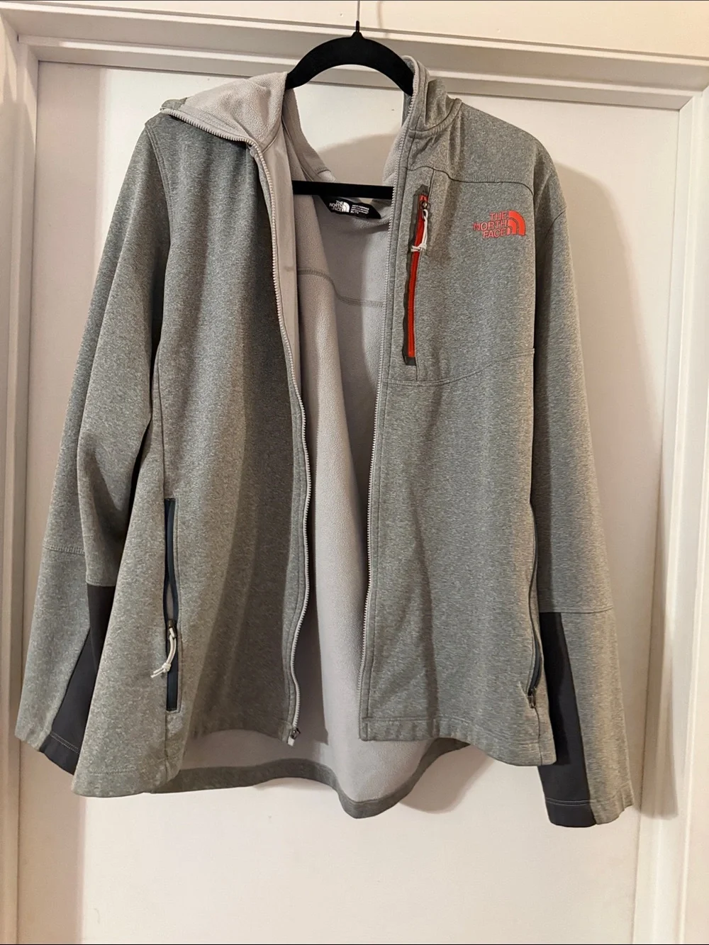The North Face Light Gray Full-Zip Jacket with Orange Logo Accent